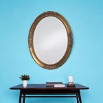 Homeroots - 33" Gold Oval Framed Accent Mirror