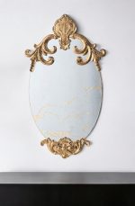 Homeroots - 26" Gold Crowned Top Resin Framed Antiqued Glass Accent Mirror