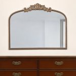 Homeroots - 31" Gold Arch Iron Framed Accent Mirror