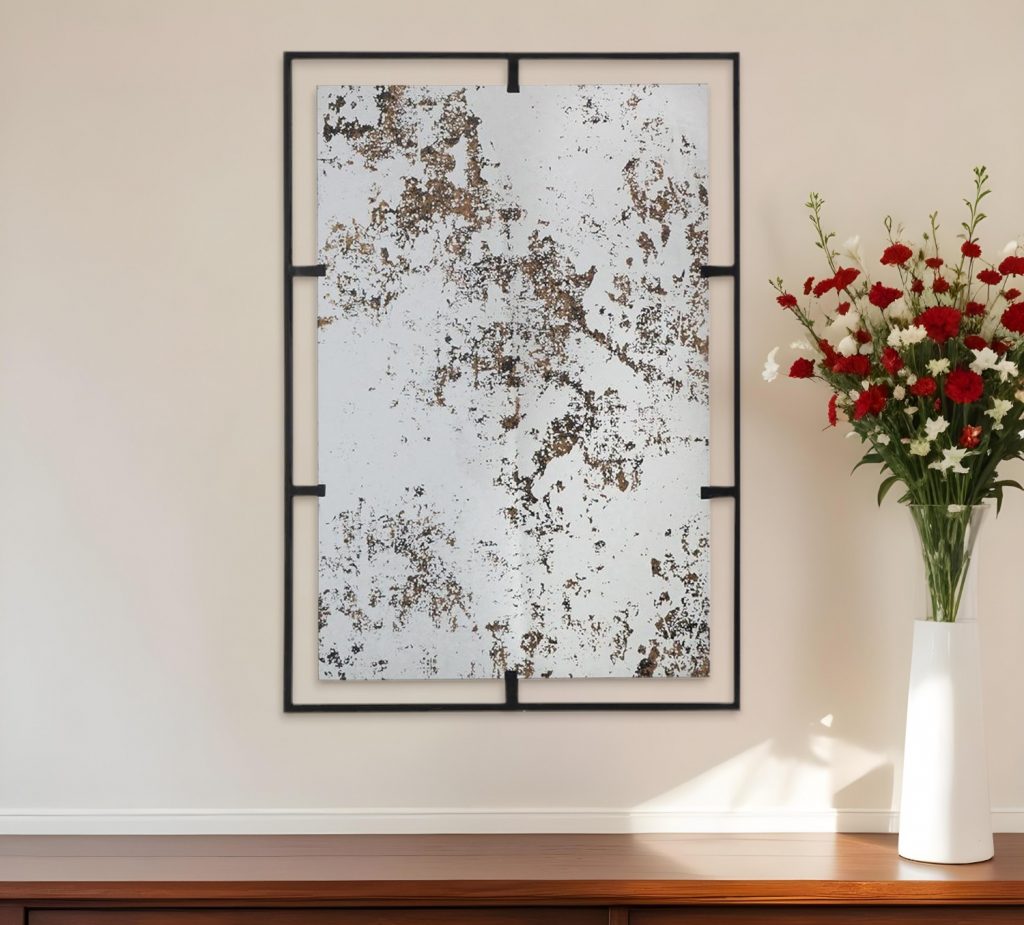 Homeroots - 32" Black Iron Framed Antiqued Glass Accent Mirror