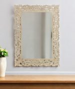 Homeroots - 47" Antiqued White Solid Wood Carved Scrollwork Accent Mirror