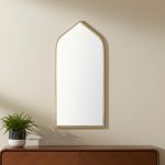 Homeroots - 48" Gold Metal Arch Framed Accent Mirror